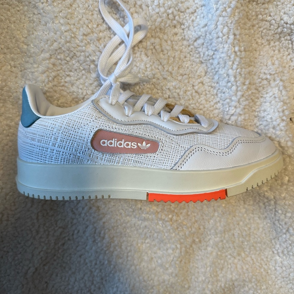 *Sold* Adidas sneakers. Never worn